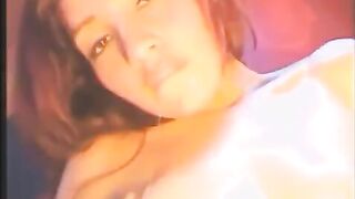 Girl caresses herself with a vibrator in all her holes
