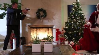 A cheeky girl gets fucked by a man in a Santa costume