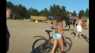 Nudist beauties fuck on the sandy beach without any covers