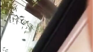 The guy jerks his dick in the street. Public handjob naked