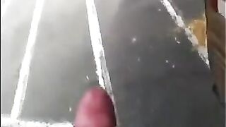 The guy jerks his dick in the street. Public handjob naked