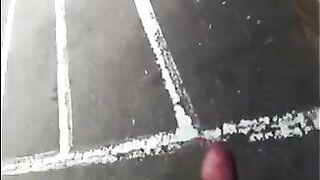 The guy jerks his dick in the street. Public handjob naked