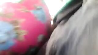 A man is rubbing his cock through the cloth on a bus with random women