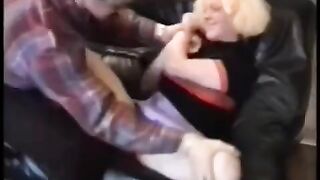 A sexy chick is having fun with a guy on his motorcycle