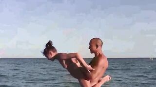 Naked gymnastics on the beach is always exciting