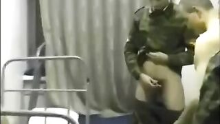 Barracks sex: two soldiers fuck a girl in their uniform