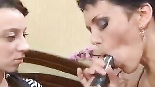 A mother is giving a lesson to her Russian daughter on how to give a blowjob