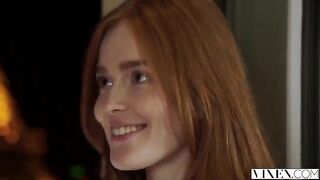 The guy carefully licked the red hair of a passionate girl on the bed