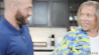 A blonde with big boobs gets attention from two guys