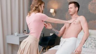Lovers have a conversation while lying on the bed naked