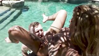 A pervert has sex with his relative in the pool, showcasing fake tits action