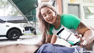 The girl is having sex with her mechanic in the car
