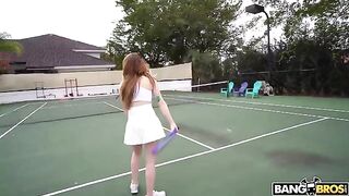 A seductive girl gets a tennis lesson from her coach