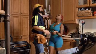 The sexy hostess is playing a role on the set of a kitchen uniform