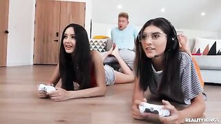 A hot chick is fucking her boyfriend in the gaming room with roommates