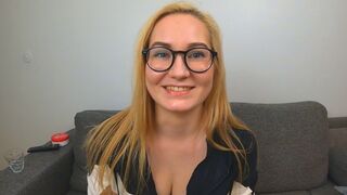 A girl was talking to a man on the street and her boobs were visible