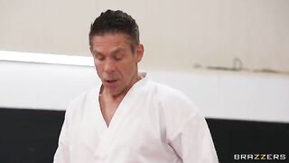 A girl gets fucked in an uncomfortable position by her trainer