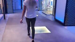 The sales girl is willing to do anything to make a sale