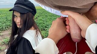 The girl was collecting seeds, but the boy interrupted her in a naughty way