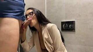 A hot brunette has sex right in the office without leaving the booth