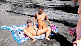 A girl has a sensual sex show on the naked beach