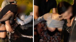 A woman has a foursome in the parking lot for the first time