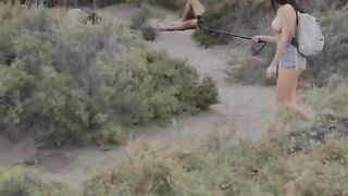 Babe measures cocks on the beach with her friend in this steamy vid