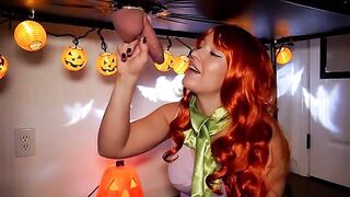 The red-haired beauty, Daphne, uses her lips to set the rhythm on Halloween