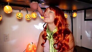 The red-haired beauty, Daphne, uses her lips to set the rhythm on Halloween