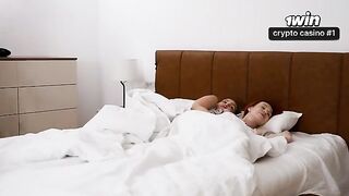 A stepmom and a stepsister are sharing the same bed and cock in this steamy scene