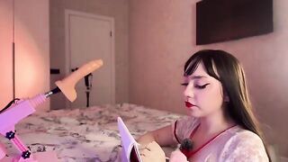 A nurse-girl has an experiment with a rubber dildo