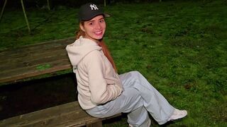 A girl has sex with a stranger in the park, showcasing her daring side
