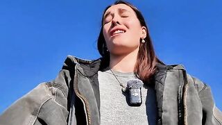 A young woman finds relaxation through solo play outdoors on the beach