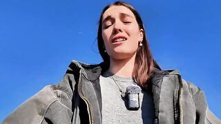 A young woman finds relaxation through solo play outdoors on the beach